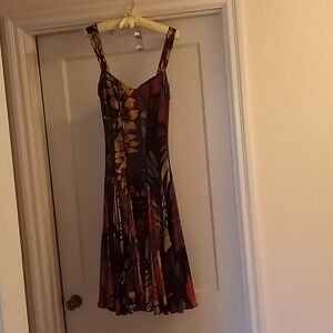 Elana Kattan size medium sleeveless floral mid rise pleated dress